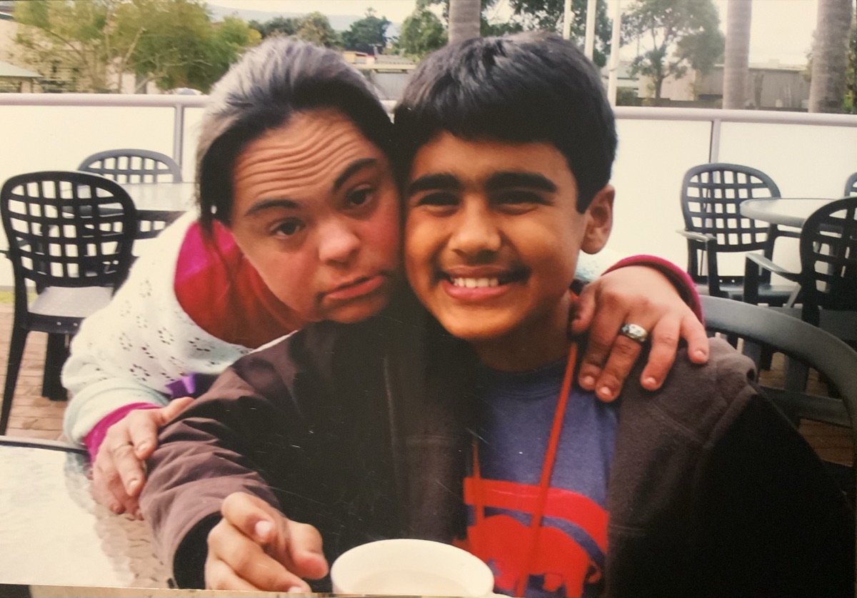Our founder Sebastian as a boy, being hugged by his auntie